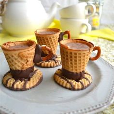 three waffle cups are sitting on a plate