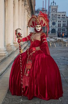 This striking clear image of a female participant in the Venice Carnival is posing for the camera to reveal her beautiful eyes inside the ornate, hand painted traditional mask.  Venice Carnival happens once a year before Easter and lasts two weeks. I have photographed this unique event twice so far and I want to return to do it again. Venice is both classic and romantic and the variance in Venetian costumes makes each carnival unique.  People from all over the world come to attend and most participate even if it involves wearing only a small mask.  The costumes cost in the thousands of dollars and on some nights, large balls are filled with costumed revelers who are donned in glorious fabric, vintage dress shoes, hand painted masks and elaborate wigs. As a photographer, I am constantly see Venetian Costumes, Venetian Costume, French Dresses, Jester Mask, Venice Carnival Costumes, Carnival Fashion, Costume Venitien, Carnival Dress, Masquerade Theme