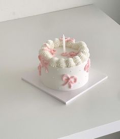 a white cake sitting on top of a table