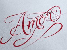 an image of the word love written in red ink on white paper with some type of lettering