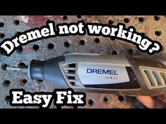 an electric drill with the words, dremel not working? easy fix