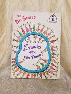 the book dr seuss on be thinks you can think is sitting on a bed