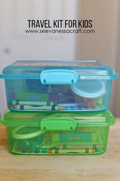 two plastic containers filled with toys on top of a wooden table