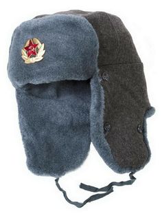 Up for sale is a Russian ushanka-hat with a Soviet red star badge. This hat has ear flaps that can be tied up to the crown, or fastened at the chin to protect the ears, jaw and lower chin from the cold. The dense fur also offers some protection against blunt impacts to the head. This ushanka-hat is manufactured from genuine 100% sheepskin to keep you warm in the worst of weather. It has Soviet markings of Tysmenitsa Fur Factory and is dated 1989. Never used, new old stock. Russian size 58 (Mediu Russian Ski Hat, Ushenka Hat, Ushanka Hat Side, Russian Winter Hats, Domo Russian Hat, Russian Hat, Russian Winter, Army Hat, Aviator Hat