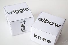 two boxes with words cut out to spell the word wiggle and elbow