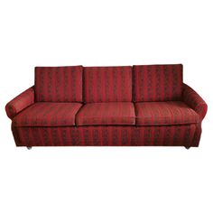 a red and black striped couch on a white background