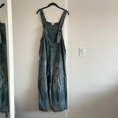 Such A Cute Oversized Denim Jumpsuit! Brand New And Fits Like A M Overalls Baggy, Cheap Medium Wash Button-up Denim Jumpsuit, Dark Wash Full-length Denim Jumpsuit With Pockets, Medium Wash Button-up Denim Jumpsuit, High-rise Cotton Denim Blue Jumpsuit, Full-length Blue Cotton Denim Jumpsuit, Vintage Overalls, Denim Romper, Denim Overalls