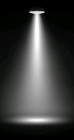 an image of a spotlight in the dark