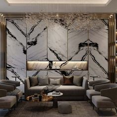 an elegant living room with marble walls and couches in grey, gold and white colors