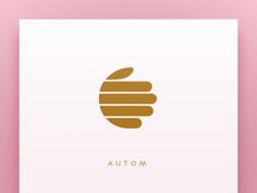 the logo for autom is shown in gold on a white paper with a pink background