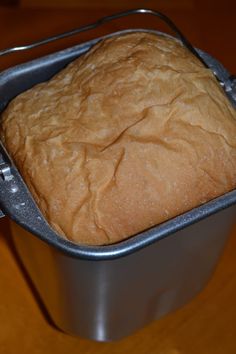 a loaf of bread in a metal container