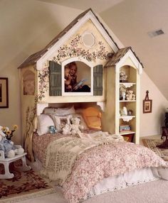 a child's bedroom with a doll house bed