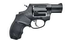 a black revolver on a white background with the trigger pointing towards the camera, showing the barrel