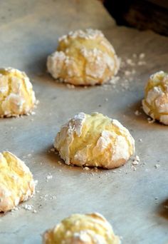 doughnuts are sitting on a baking sheet ready to go into the freezer