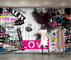 a wall that has some type of clothing on it with words written all over it