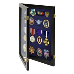 a display case with medals and badges in it's glass door, on a white background