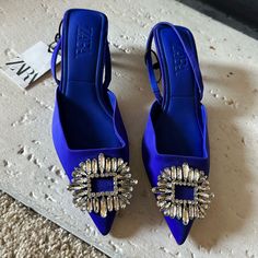 Royal Blue Zara Slingback Heels Similar To Roger Vivier Size 38, 7.5 Brand New Tags Attached Blue Slingback Heels With 4-inch Heel, Blue Slingback Pumps With 4-inch Heel For Evening, Blue Open Heel Slingback Pumps For Evening, Blue Pointed Toe Slingback Pumps For Party, Blue Slingback Sandals For Spring Party, Chic Blue Pointed Toe Slingback Pumps, Blue Summer Party Slingback Sandals, Chic Blue High Heel Slingback Pumps, Blue Open Toe Slingback Pumps For Party