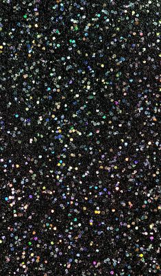 the sky is filled with multicolored confetti flecks and stars