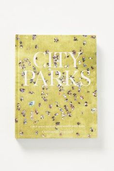 a book with the title city parks written in white and yellow on top of it