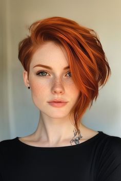 The Red Hair Undercut Bob is a striking and edgy hairstyle that combines bold color with a modern cut. Edgy Ginger Hair, Hairstyles Undercut, Undercut Bob Hairstyles, Bold Haircut For Women, Bixie Red Hair, Short Haircuts For Women Edgy, Bob Undercut Hairstyles, Red Undercut Hair, Short Thick Red Hair