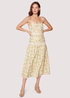 Refresh your everyday style with the Earth Angel Midi Dress. The soft floral print gives off a laid-back feminine vibe, and the charming lace trim adds a touch of subtle elegance. Adjustable spaghetti straps and an easy-to-use side zipper make this dress a no-fuss choice for your weekend escapades, whether you're strol Flowy Fashion, Pastel Floral Dress, Subtle Elegance, Earth Angel, Soft Floral, Pastel Floral, Farmer's Market, Cold Air, Short Rompers