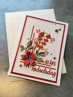 two cards with flowers on them and the words, 50 ans fadsselag