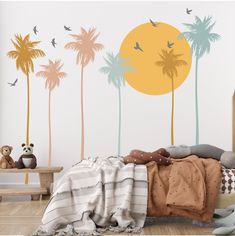 a child's bedroom with palm trees and birds on the wall