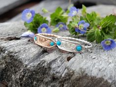 The Kaia is a knockout!  This chic cowgirl staple features a bright pop of color with a pair of vibrant round turquoise on either side of a hand-engraved middle section. The wide part of the band is a dainty 5mm, perfect to show off the hand-engraving and for subtle sparkle. The band itself is cute too, in a sweet rope style.  Available in both 10K rose and 10K white gold. Made with love in the rural oasis of Eminence, Missouri, this little beauty is perfect for the modern cowgirl who wants a subtle statement piece in her collection.  We make each piece by hand, one at a time, for every order. Because of this, your final piece may vary slightly from the picture and the engraving style may be adjusted slightly to fit your ring size or customizations. Please allow at least 5 to 6 weeks for s Eminence Missouri, Cowgirl Ring, Chic Cowgirl, Turquoise Wedding Band, Rodeo Jewelry, Western Rings, Cowgirl Wedding, Modern Cowgirl, Bright Pop