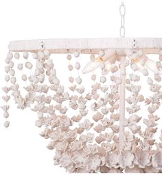 a chandelier with white flowers hanging from it's sides and two lights on each side