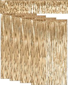 gold tinsele fringes hanging from the ceiling