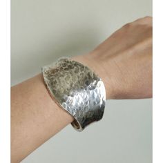 Discover A Unique Piece Of Artisan Craftsmanship With This Stunning Vintage Sterling Silver Mexican Hammered Cuff Bracelet. Weighing A Substantial 35.6 Grams, This Bracelet Showcases The Intricate Artistry Of Traditional Mexican Silversmithing. Features: Material: Sterling Silver Weight: 35.6 Grams Width: 2 Inches (Front, Widest Area) Hallmarks: Stamped 925 And Mex, Signifying Genuine Quality And Mexican Origin Design: Hammered Texture For A Rustic Yet Sophisticated Look Condition: Excellent Vin Elegant Hand-cast Cuff Jewelry, Elegant Hand Cast Cuff Bracelet, Handmade Artisan Bangle, Handmade Cuff Bracelet For Wedding, Handmade Wedding Cuff Bracelet, Handmade Elegant Cuff Bracelet, Elegant Handmade Cuff Bracelet, Handmade Artisan Cuff Bracelet, Elegant Hammered Cuff Bangle