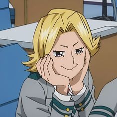 an anime character sitting at a desk with his hand on his face and looking off to the side