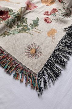 Give a lush statement to your home with this vintage floral woven throw blanket. Features vintage floral drawing motifs allover including sunflowers, wildflowers, bird of paradise, roses, and more. Trimmed with fringed edges and contrasting reverse at back. Content + Care- 100% Cotton- Machine Wash, Cold Cycle, Mild Detergent, Do Not Bleach; Tumble Dry Low Heat- Made in the USA Size- Dimensions: 37”W x 52”L- Dimensions: 50”W x 60”L- Dimensions: 60”W x 80”L Floral Throw Blanket, Tapestry Blanket, Woven Throw Blanket, Floral Drawing, Vintage Cross Stitches, Bird Of Paradise, Woven Throw, Birds Of Paradise, Floral Motifs