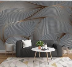 a living room scene with focus on the sofa and wallpapers that are designed to look like wavy lines