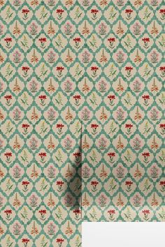 a wallpaper with an ornate design on the back and side of it, in shades of