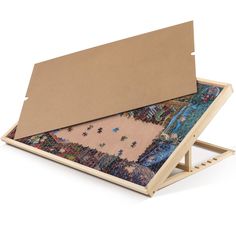 PRICES MAY VARY. Premium Material - Lavievert puzzle board is processed out of quality pinewood, sturdy and durable. The suede covering ensures enough friction to effectively prevent puzzle pieces from sliding or falling even if the board tilts at a certain angle. Five Angle Adjustments - Comes with 5 angle adjustments ranging from 0° to 30°. There is always a right angle for you to abate stress and fatigue in your neck, waist or back, and thus your health is ensured and attention is focused on Jigsaw Puzzle Accessories, Jigsaw Puzzle Table, Puzzle Storage, Puzzle Table, Human Centered Design, Wooden Jigsaw Puzzles, Wooden Jigsaw, Puzzle Board, 1000 Piece Jigsaw Puzzles