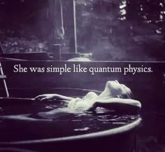 a woman laying in a bathtub with the caption she was simple like aquarium physics