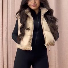 Beige Puffer Vest Nwn Beige Puffer Gilet, Brown Puffer Gilet, Black Puffer Vest Outfit Plus Size, Beige Puffy Vest Outfit, Beige Stretch Winter Outerwear, Winter Beige Stretch Outerwear, Chic Beige Stretch Outerwear, Chic Stretch Beige Outerwear, Fitted Beige Puffer Jacket For Spring