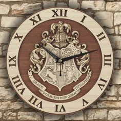 a wooden clock with an image of the coat of arms on it's face