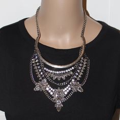 A Structured Collar Is Embellished With Antiqued Metal And Crystal Work For An Elegant Yet Tough-Girl Statement Bib. Pairs Well With A Leather Jacket. Materials: Plated Base Metal, Acrylic Closure: Lobster Clasp Measurements: Length: 17.5" With 2" Ext.; 4" Drop Baublebar Initial Necklace, Pink Diamond Necklaces, Tv Nook, Crystal Work, Eclectic Jewelry, Large Dangle Earrings, Dressy Outfit, Baublebar Earrings, Rhinestone Statement Necklace