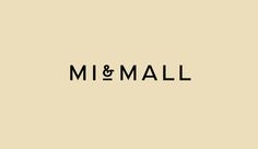 the word'm & mall'written in black on a beige background