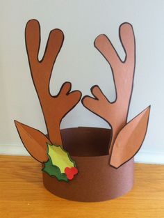 a paper hat with reindeer antlers on it