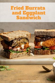 two grilled burrata and eggplant sandwich on a cutting board next to a cup of coffee