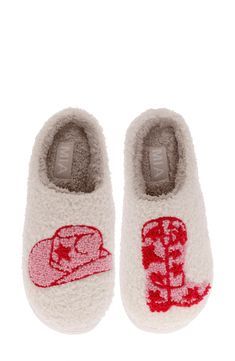 High-pile fleece furthers the comfort of a slipper lofted by a chunky platform and finished with a cute graphic. 1/4" platform Synthetic upper, lining and sole Imported Pink Cowboy, Mia Mia, Plush Slippers, Mia Shoes, Sleepwear & Loungewear, Chunky Platform, Daily Routine, Womens Slippers, Cowboy