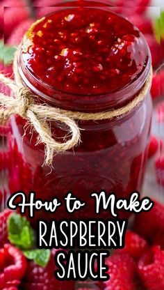 raspberry sauce in a jar with strawberries around it and the words how to make raspberry sauce