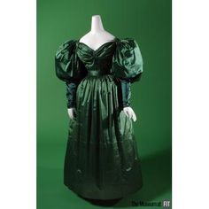 The Museum at FIT - Green silk satin dress c. 1830—but no, those are not leg-of-mutton sleeves.  That's a later term.  Check out the sleeve close-up.  And imagine this with lots of accessories.