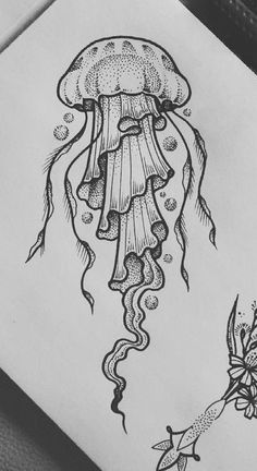 an ink drawing of a jellyfish and flowers