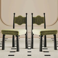 two chairs sitting side by side in front of a wall with lines on the floor