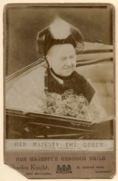 an old black and white photo of a woman in a car with the caption her majesty the queen