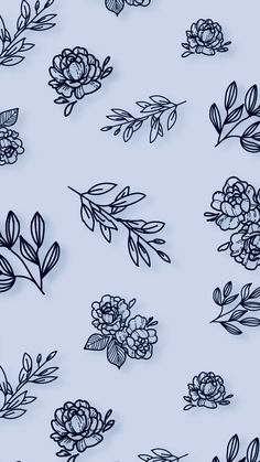 an image of flowers and leaves on a blue background